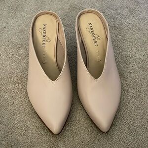 Almost new pointed toe light pink/tan heel. Very flattering on foot. Size 5